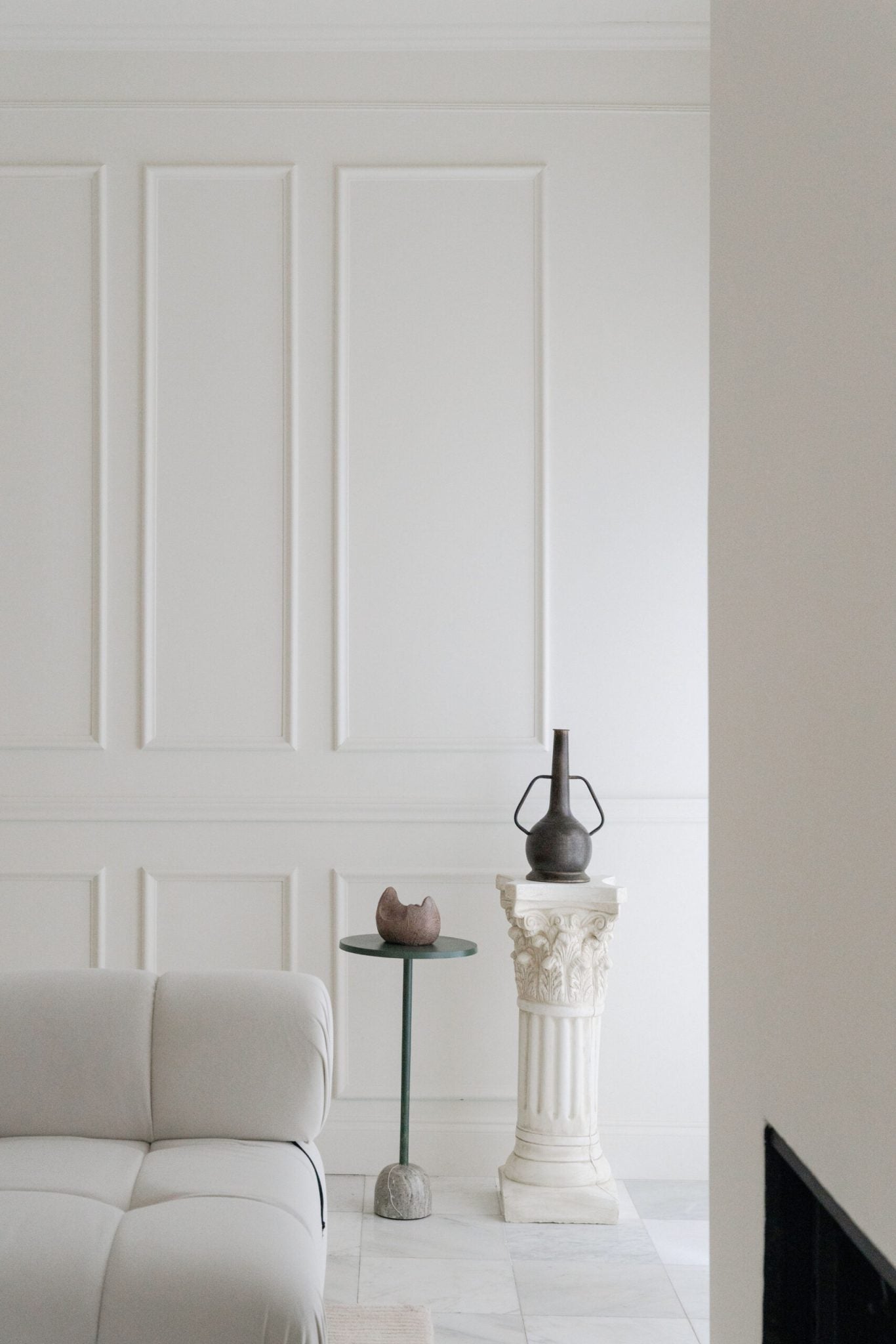 Modern living room with white walls painted using Peace of Mind interior paint by Blu Paint